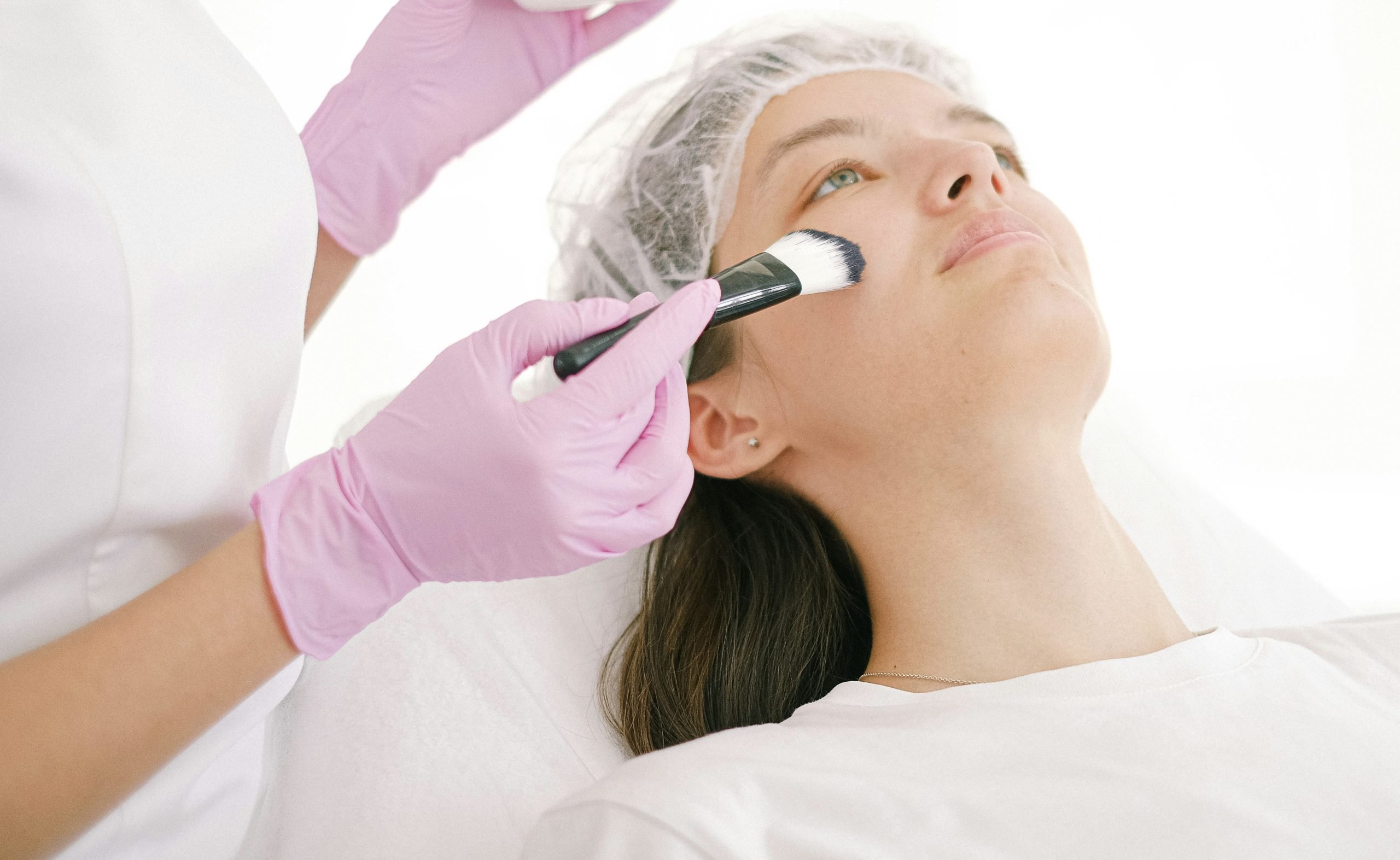 chemical peel winnipeg 2 woman receiving a facial or chemical peel